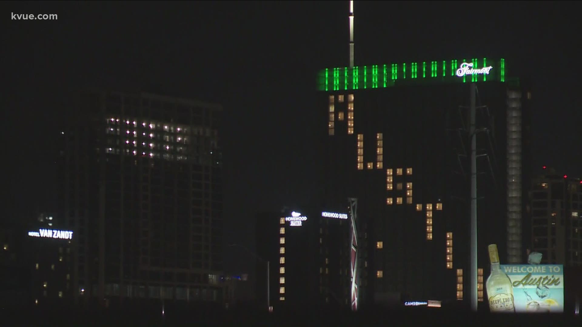 Buildings in Downtown Austin lit up green in honor of Austin FC unveiling its new jerseys.