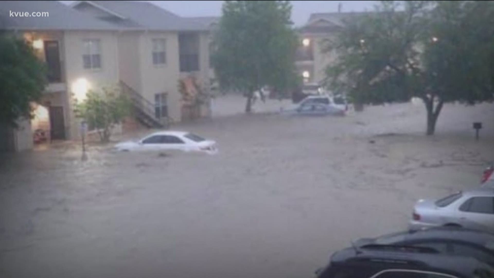 Juan Rodriguez spoke to residents at the Spring Apartments in Dripping Springs, where dozens of people saw flood damage.