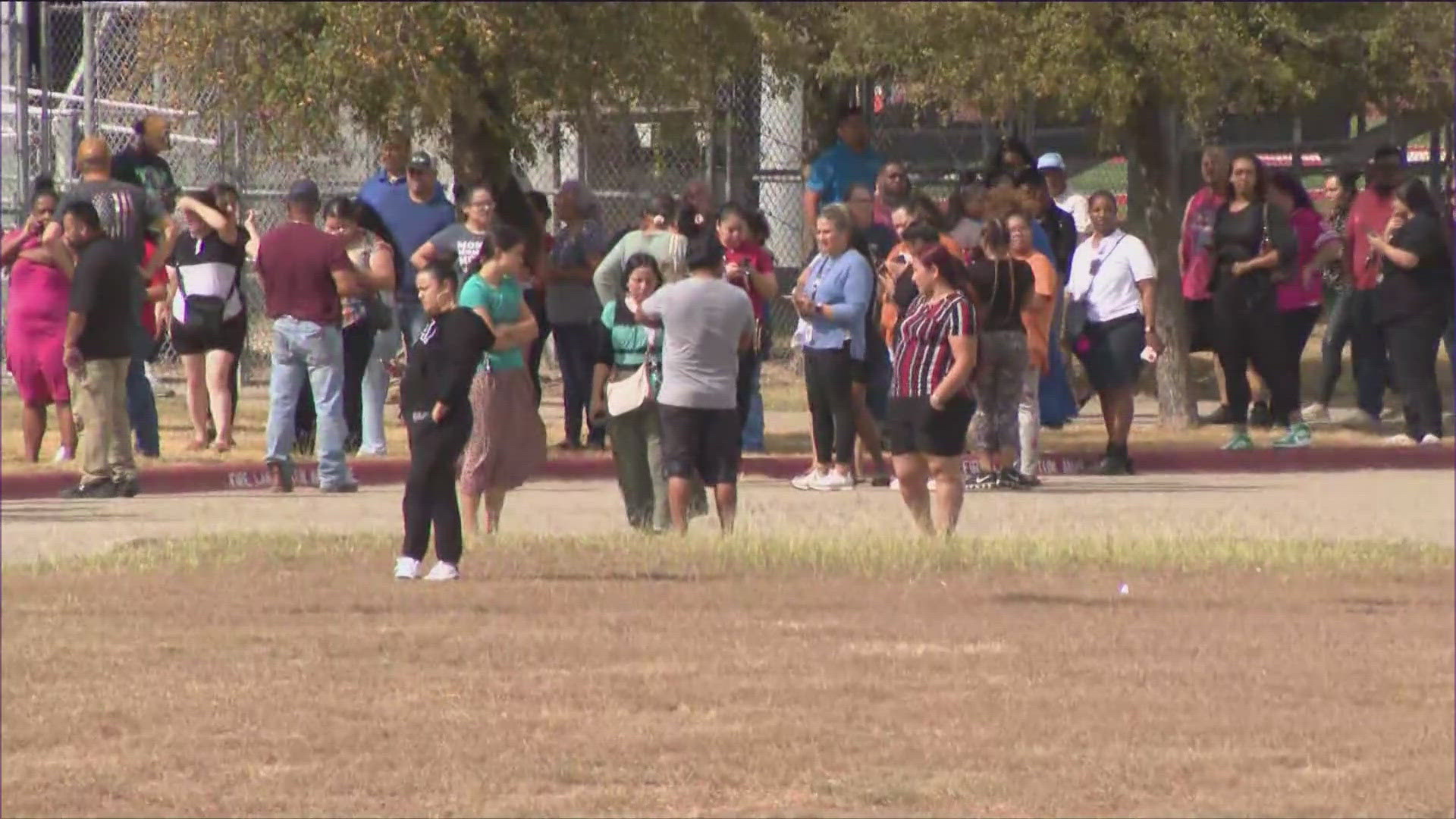 Parents rushed to the school Tuesday afternoon after an 18-year-old was killed on campus, forcing the school into lockdown.