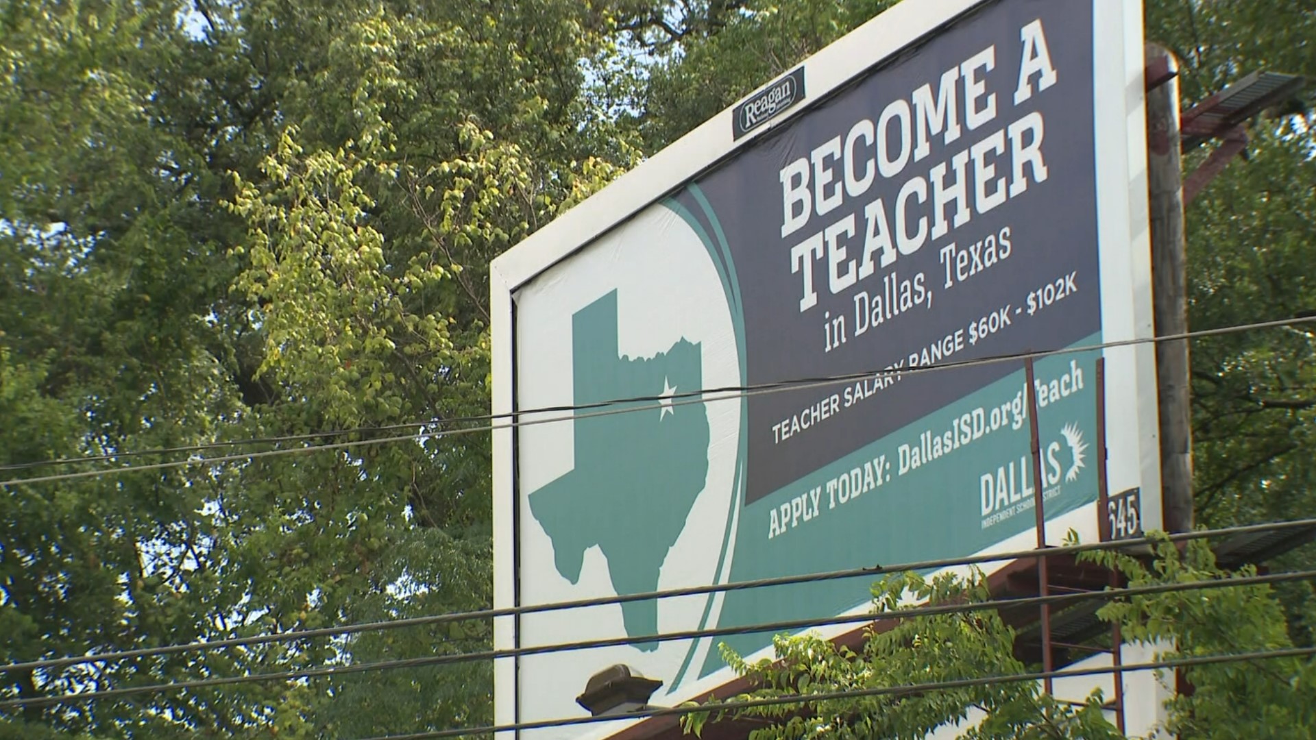 Billboards in Austin seem to be recruiting Austin-area teachers for the North Texas school district.