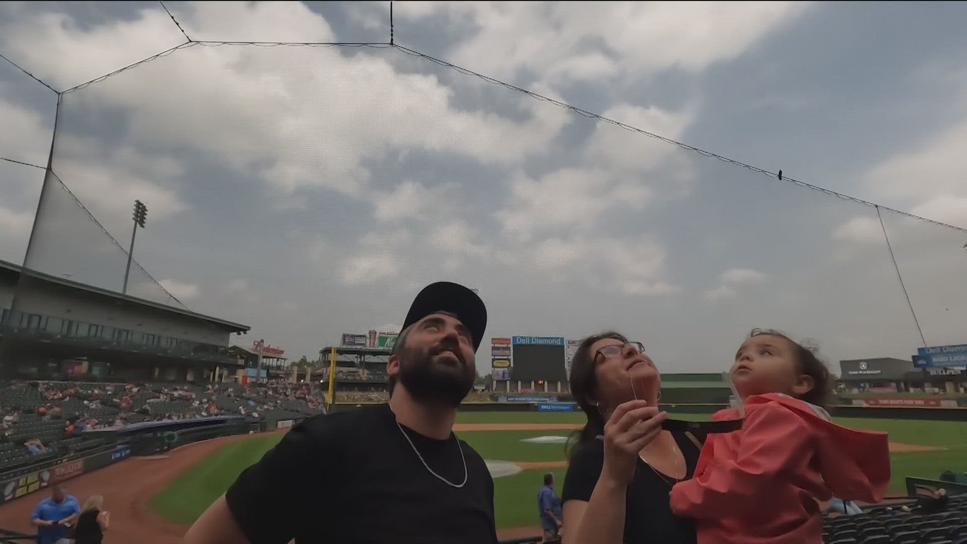 Some folks gathered at Dell Diamond in Round Rock for the "Total Eclipse of the Park" watch party on April 8.