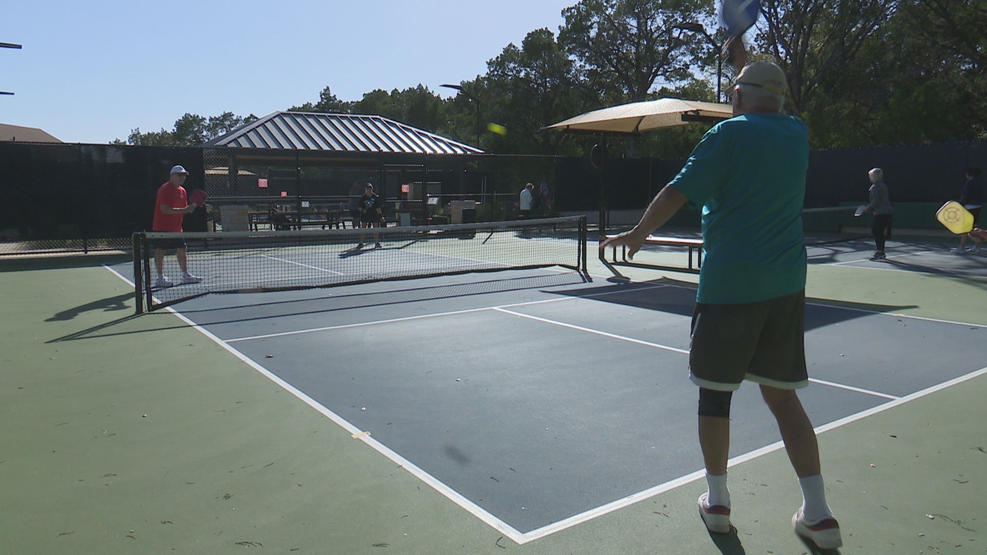 The city is repurposing and combining tennis courts and basketball courts with pickleball courts as the popularity of the sport grows.