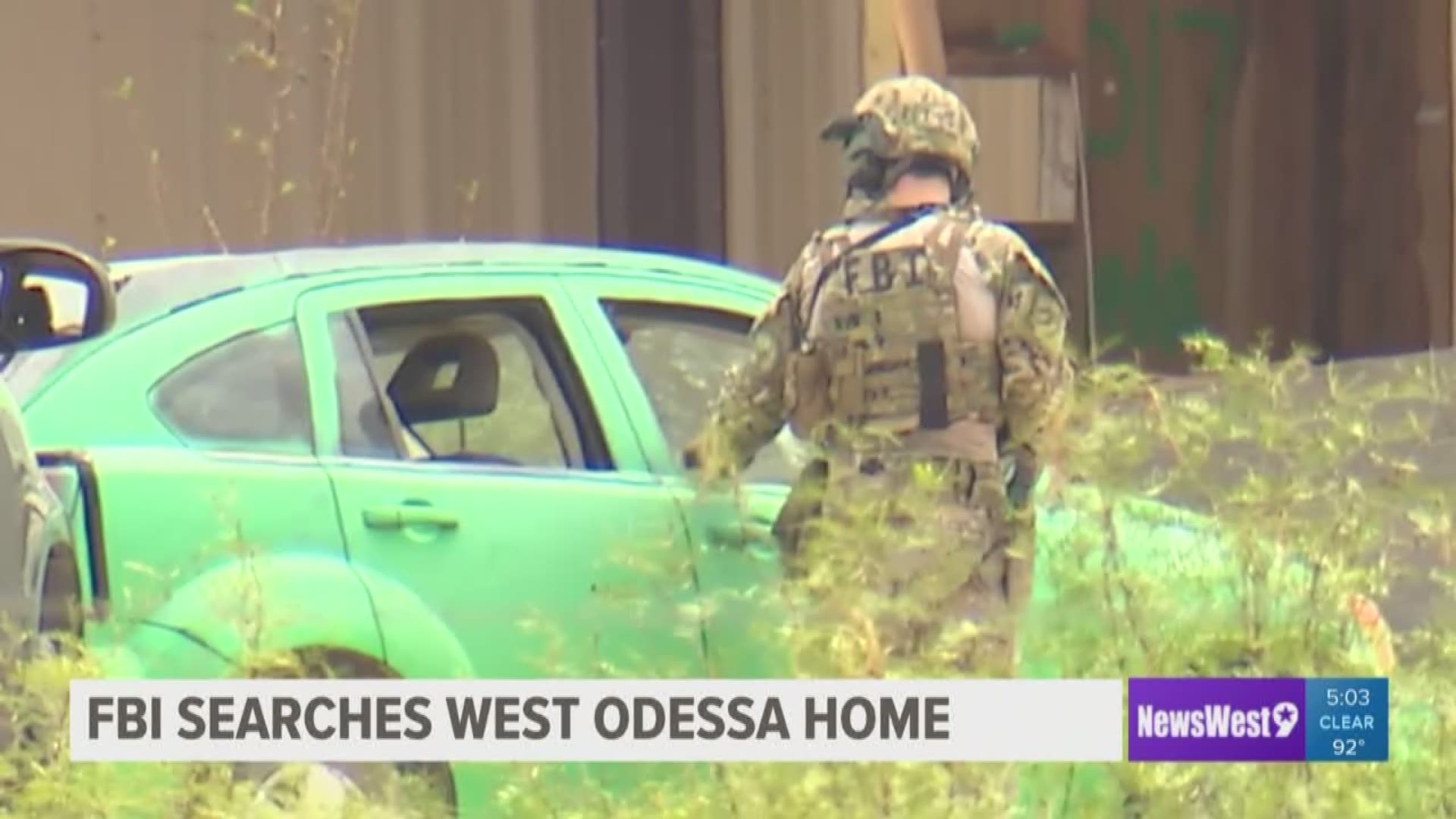 It was a tense scene at the west Texas home as federal agents shouted direction while serving a warrant.