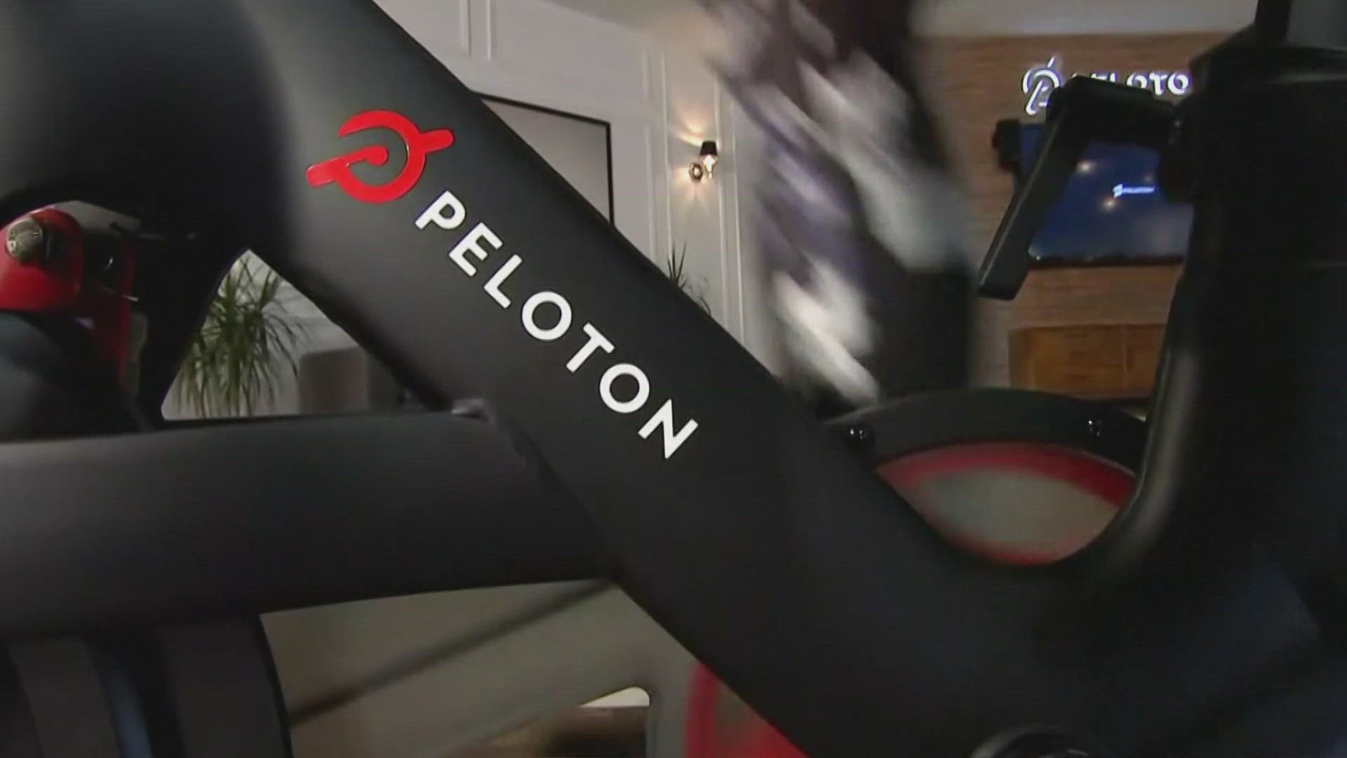 Stationary bike and treadmill maker Peloton is cutting jobs, and the company's CEO is stepping down.