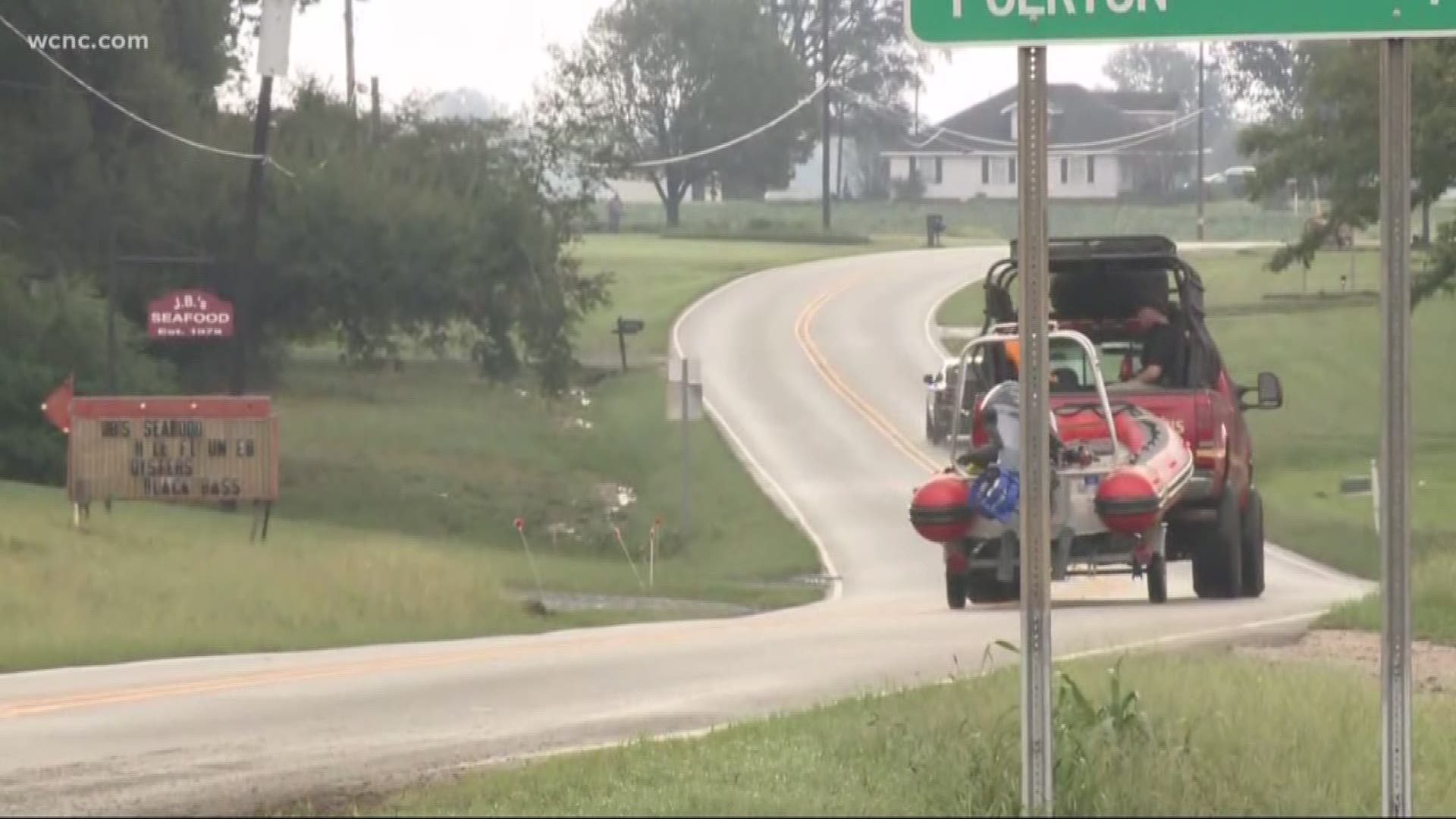 Dive crews are continuing the search for a 1-year-old boy who was swept away by rushing floodwaters of Florence Sunday night.