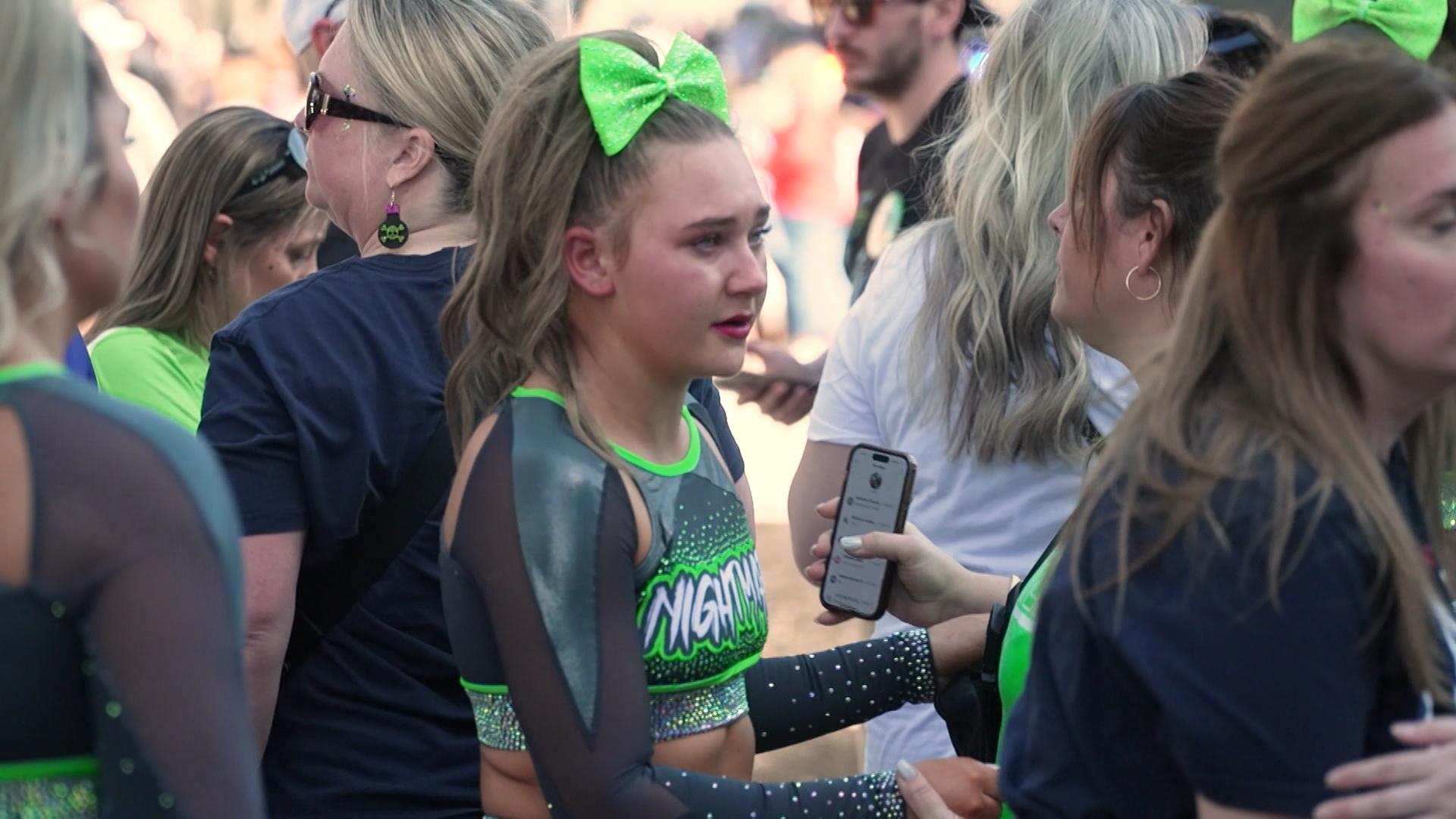 Nine families are suing Varsity Spirit and several event operators involved in the NCA All-Star National Championship after a false shooting alarm caused mass panic.