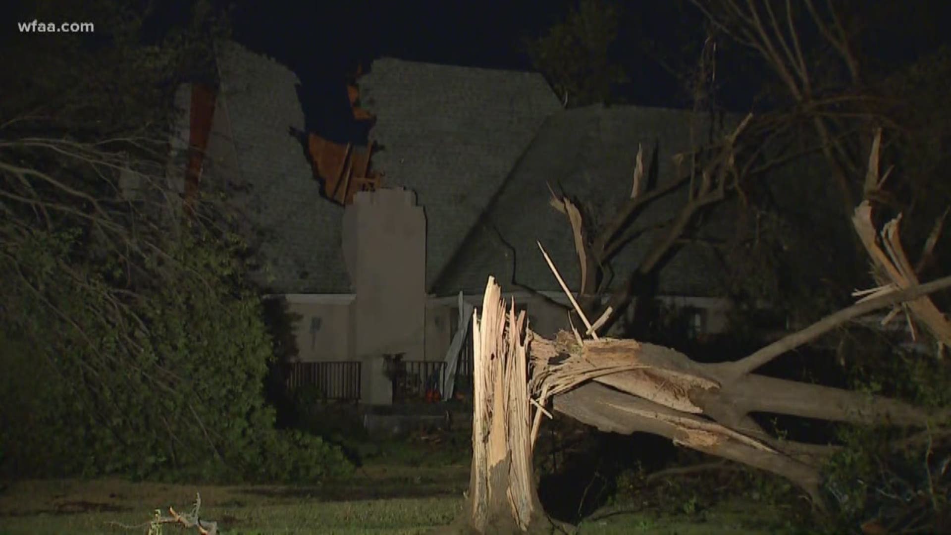 Trees are down and several homes are damaged after severe weather moved through this neighborhood.  Some residents are trapped by blocked roads.