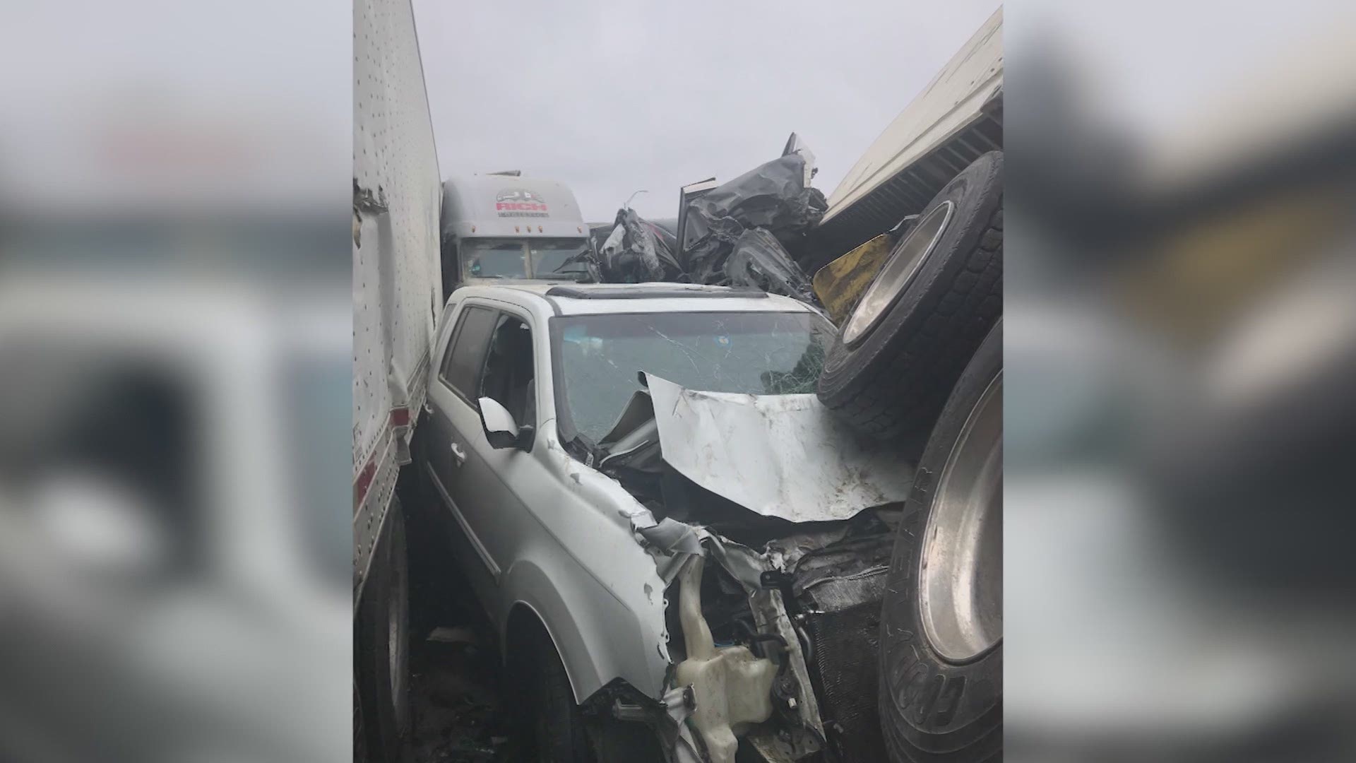 A photo of Alicia Stone's car shows it sandwiched between semi trucks; the wheels of one semi on top of her car.