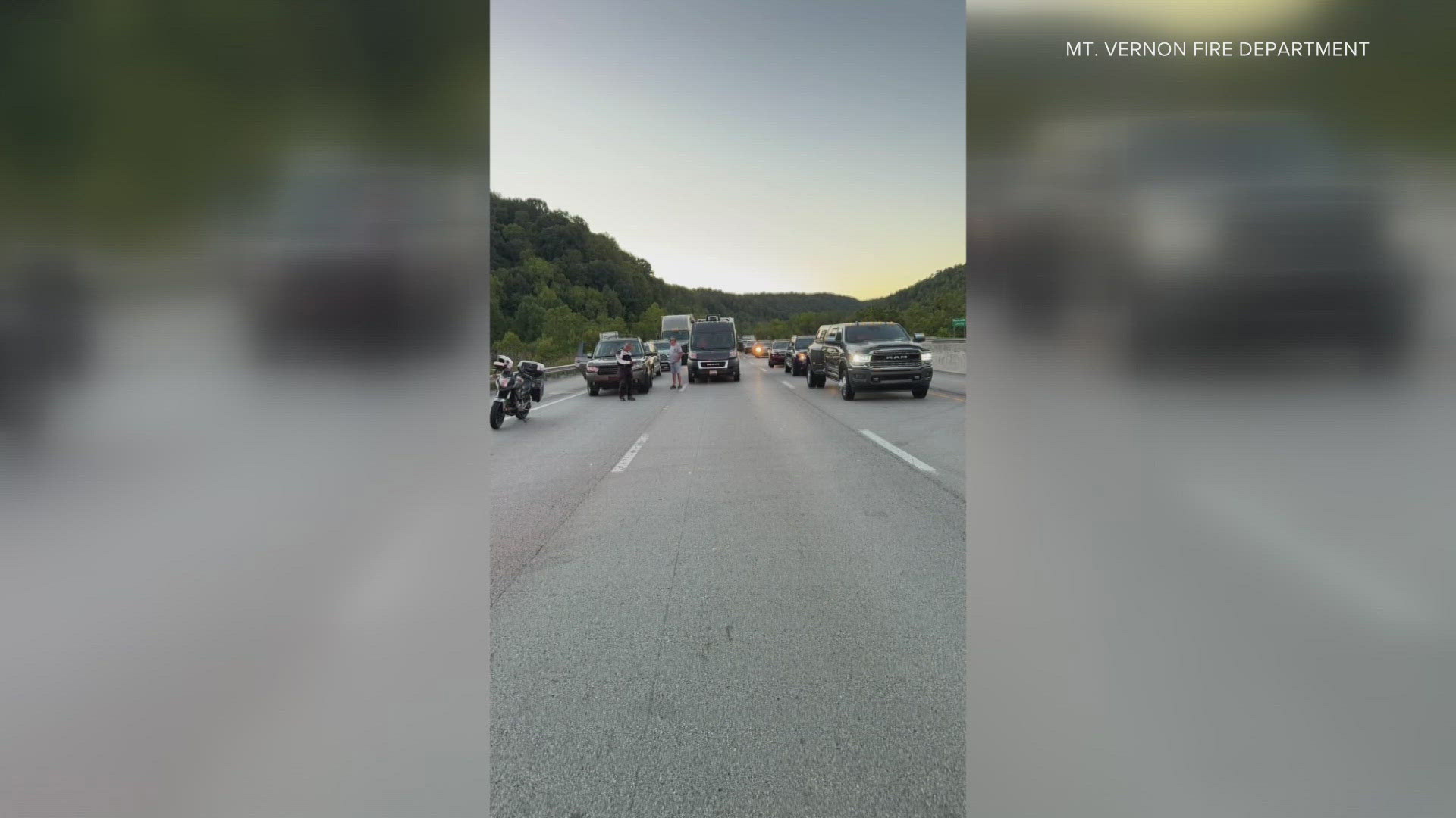 Authorities are looking for a person of interest after four people were shot and three others injured following a shooting on I-75 near London, Kentucky.