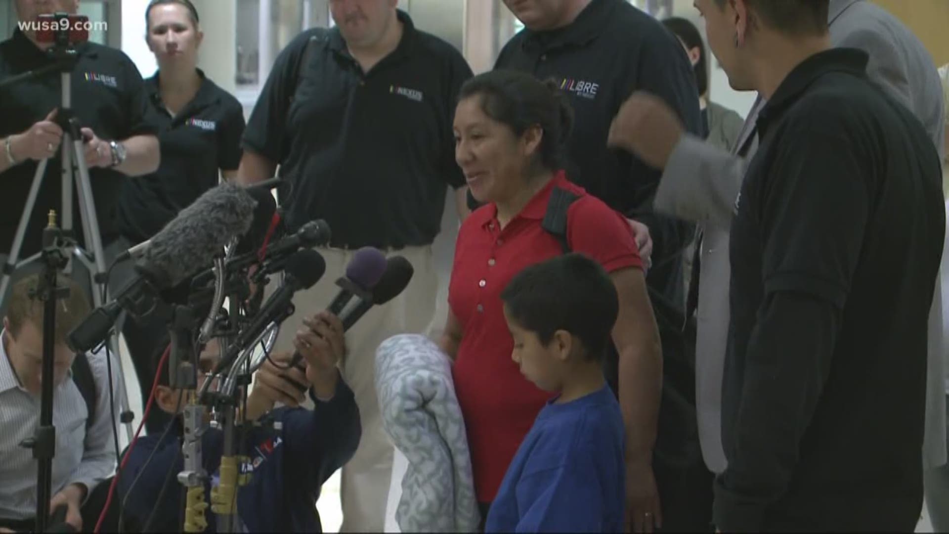 A mother and son are reunited after being separated at the border.