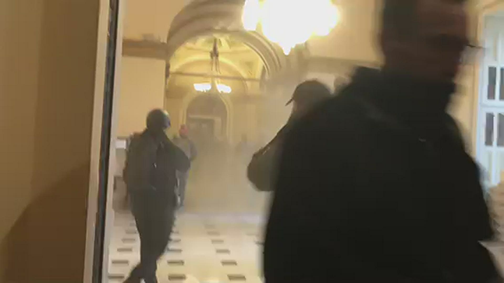 Insurrectionists were heard chanting "our house" as they coughed with smoke filling the air.